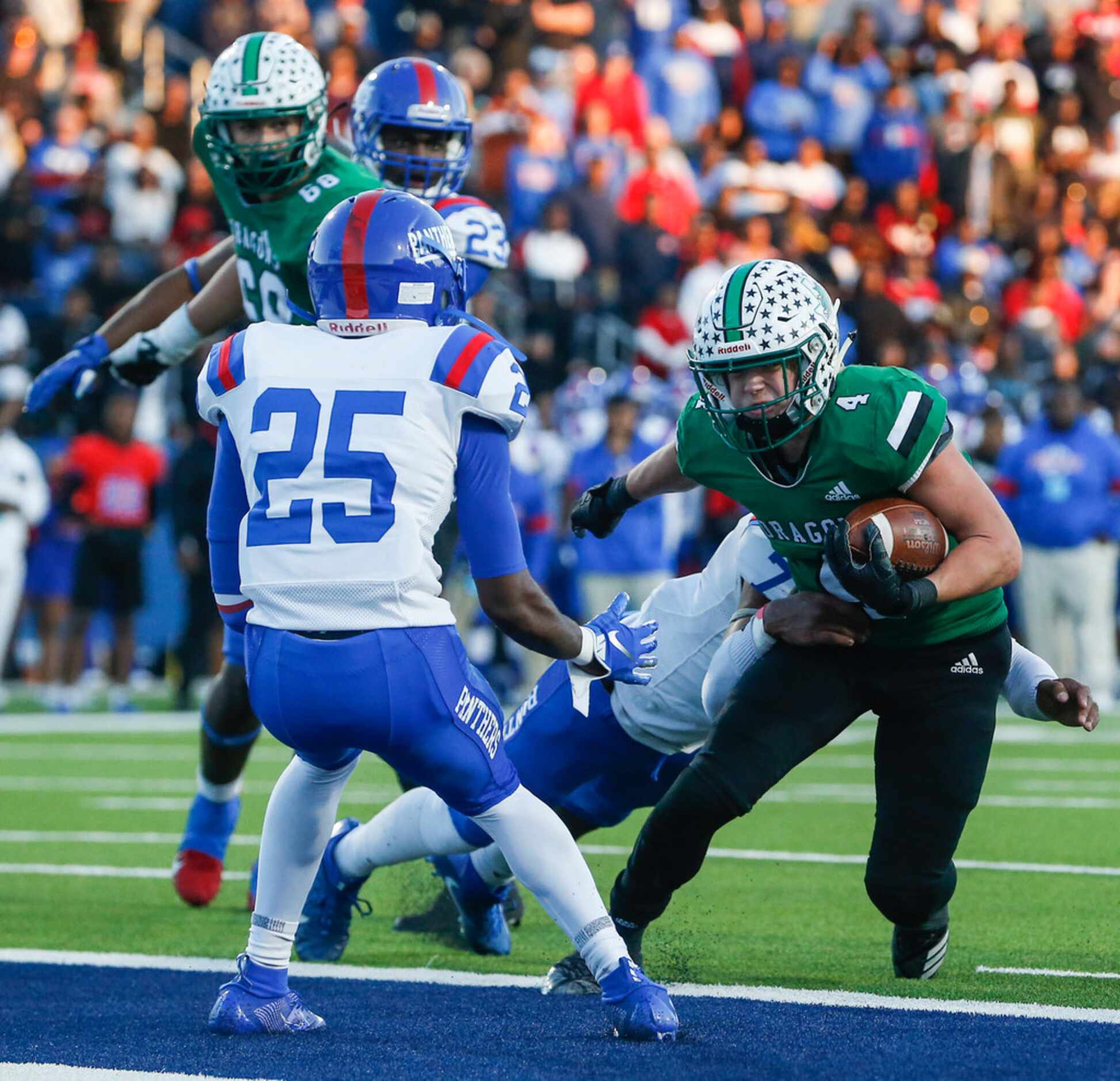 Southlake Carroll running back Owen Allen (4) walks in a touchdown during the second half of...