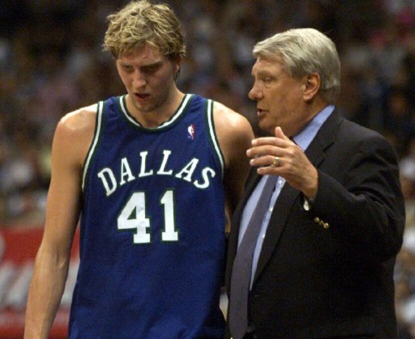 ORG XMIT: S15585286 Dallas Mavericks head coach Don Nelson talks with Dirk Nowitzki on the...