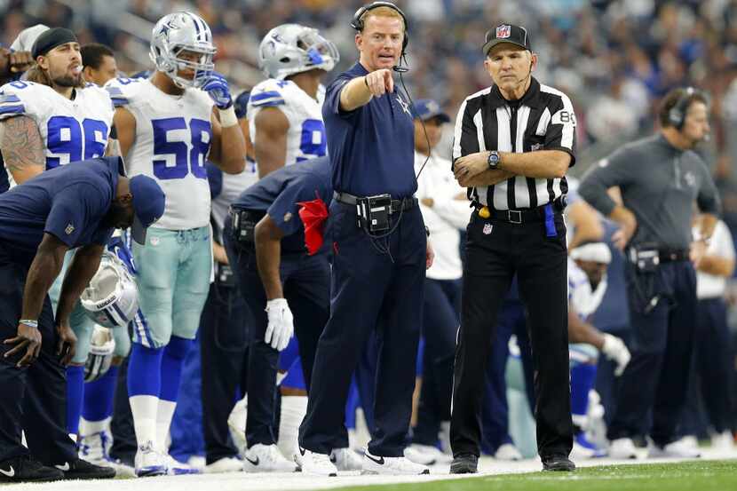 Dallas Cowboys head coach Jason Garrett voices his thoughts with field judge Greg Gautreaux...