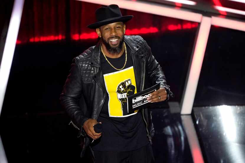 Stephen "tWitch" Boss presents an award at the Billboard Music Awards in Los Angeles on Oct....