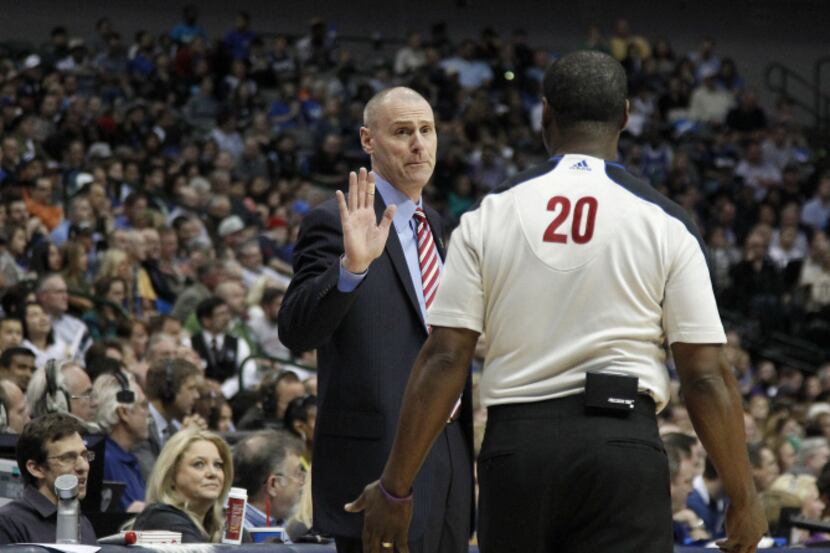 Dallas Mavericks head coach Rick Carlisle questions a call from referee Leroy Richardson...