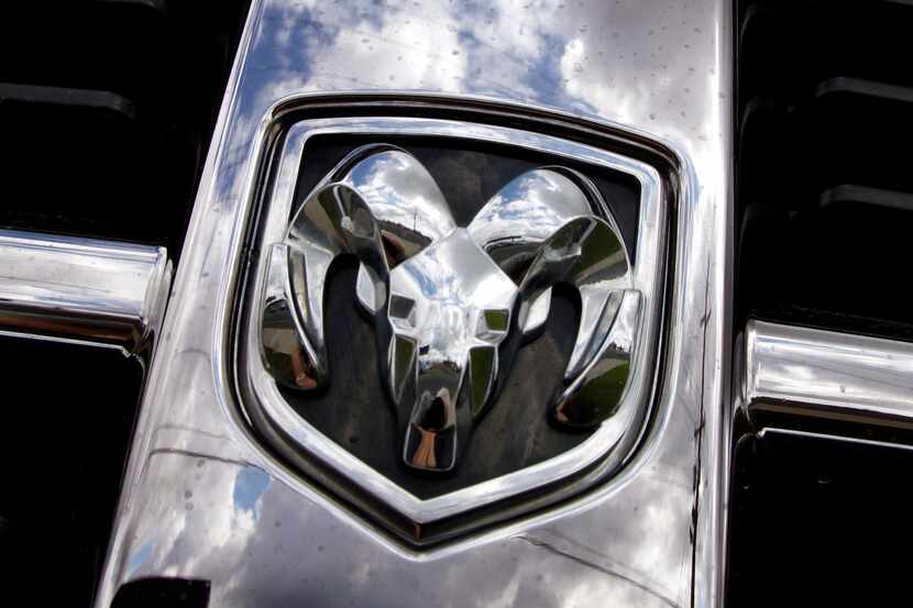 This July 13, 2011, file photo shows the Ram logo on a Ram pickup truck at a dealership in...
