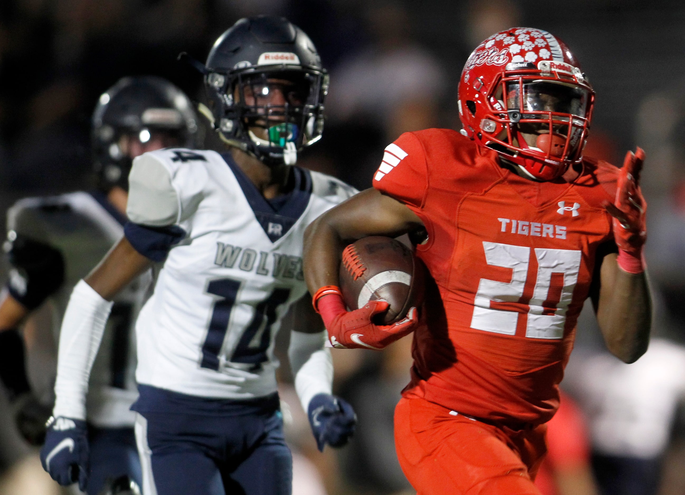 Terrell running back Chase Bingmon (20) races for his first touchdown as he pulls away from...