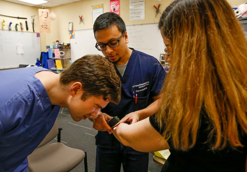 Second-year medical student Hector Filizola (left) and dermatologist Paras Vakharia, both...