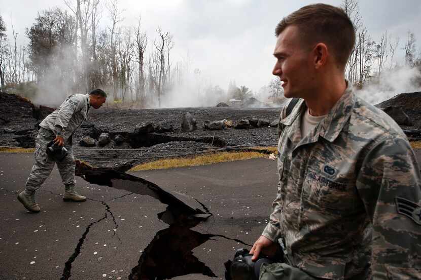 On Friday, May 18, U.S. Air National Guardsmen Orlando Corpuz, left, and John Linzmeier...