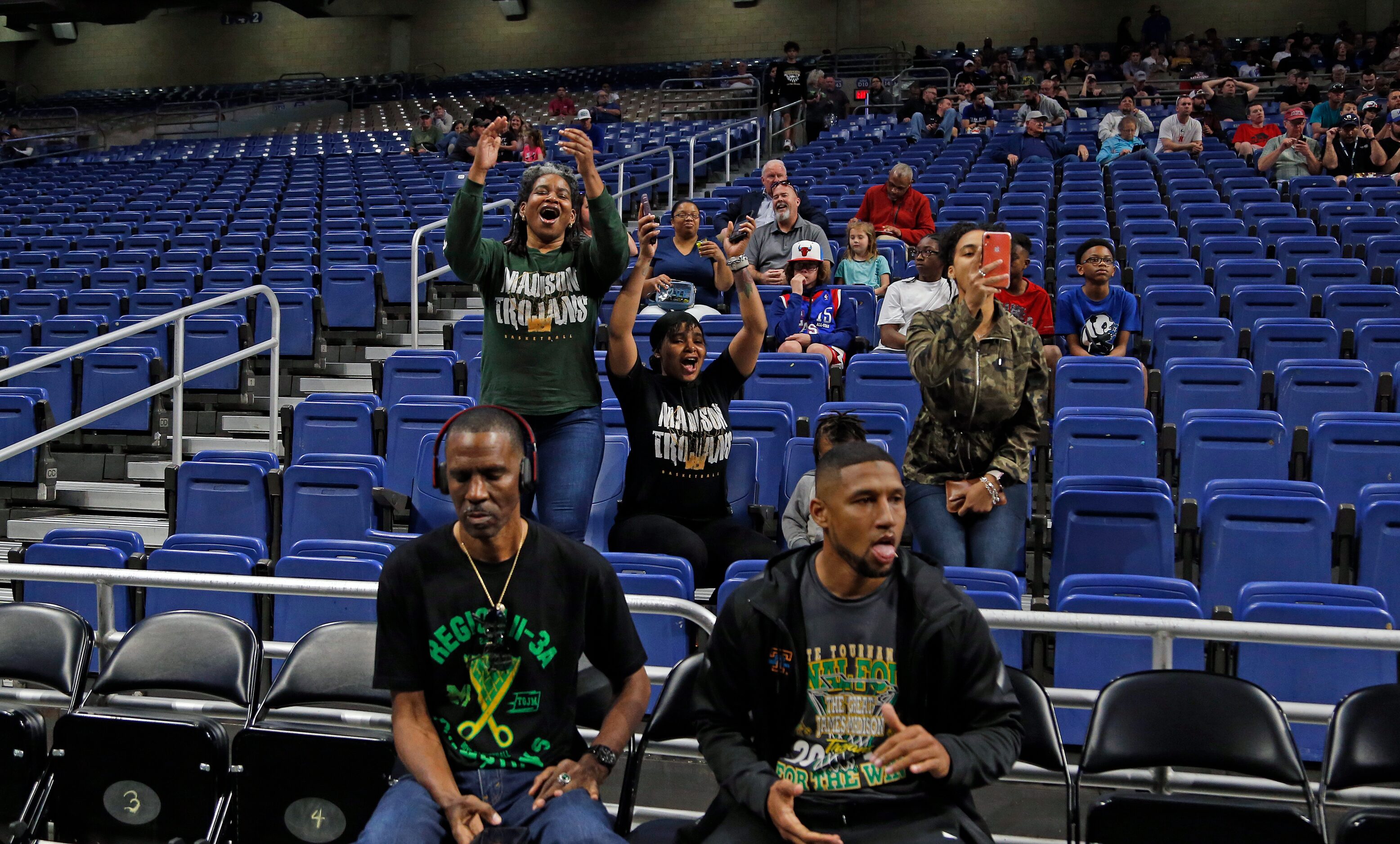 Madison fans cheer as their team is announced.  A lot of fans could not get in since they...