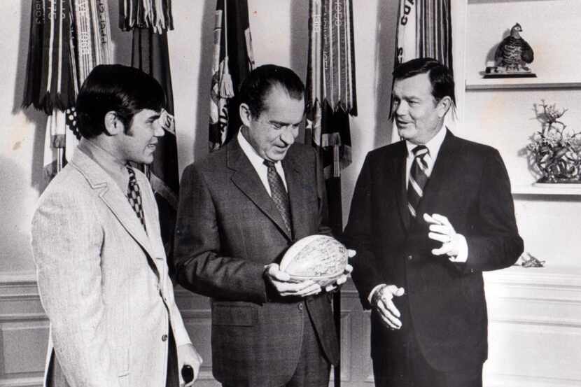 Freddie Steinmark (from left), President Richard Nixon and Darrell Royal are seen in this...