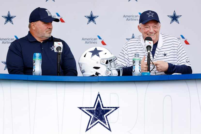 Dallas Cowboys owner Jerry Jones (right) jokes with the media during his kickoff press...