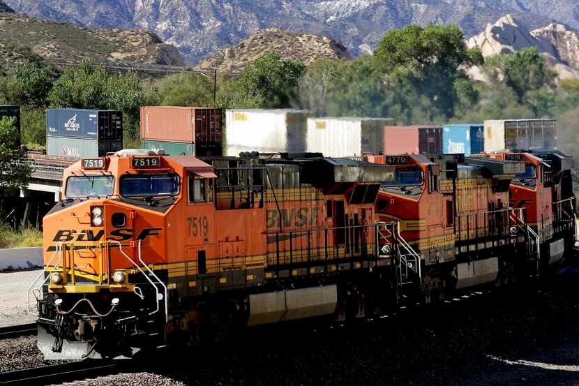 BNSF trains traveled 143 million miles last year and carried 535 million tons of cargo. The...