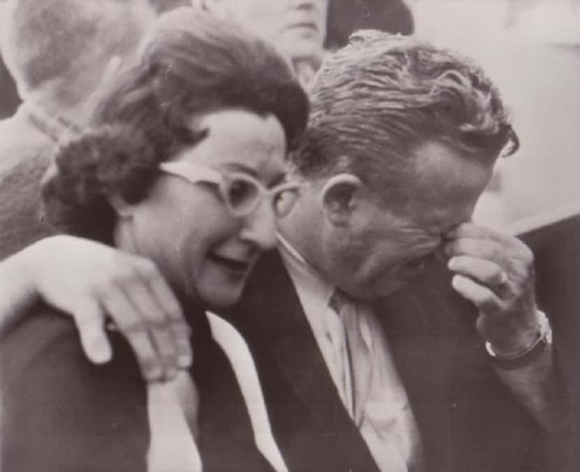 Mrs. Eileen Kaminsky of Detroit and her brother Earl Ruby weep in a Dallas courtroom today...