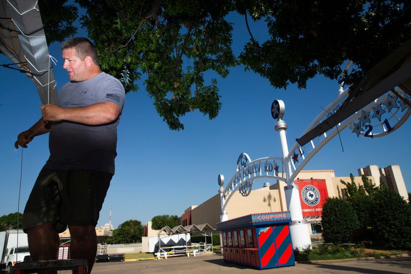 Mike Jiles of Athens is part of the crew that has been at Fair Park since Aug. 1 preparing...