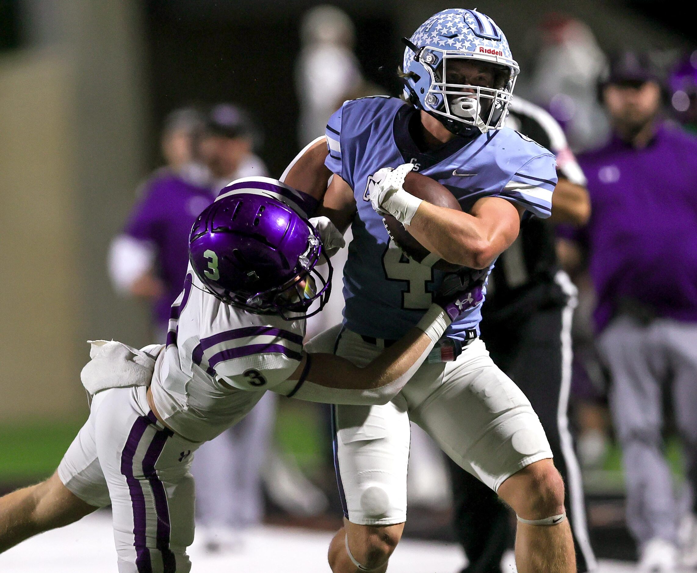 China Spring running back Kyle Barton (4) gets dragged down by Anna safety Grant Cerveny (3)...