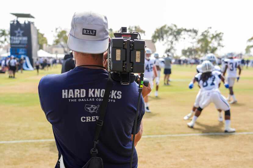 A crew from HBOs Hard Knocks captures Dallas Cowboys running back in a drill during a joint...