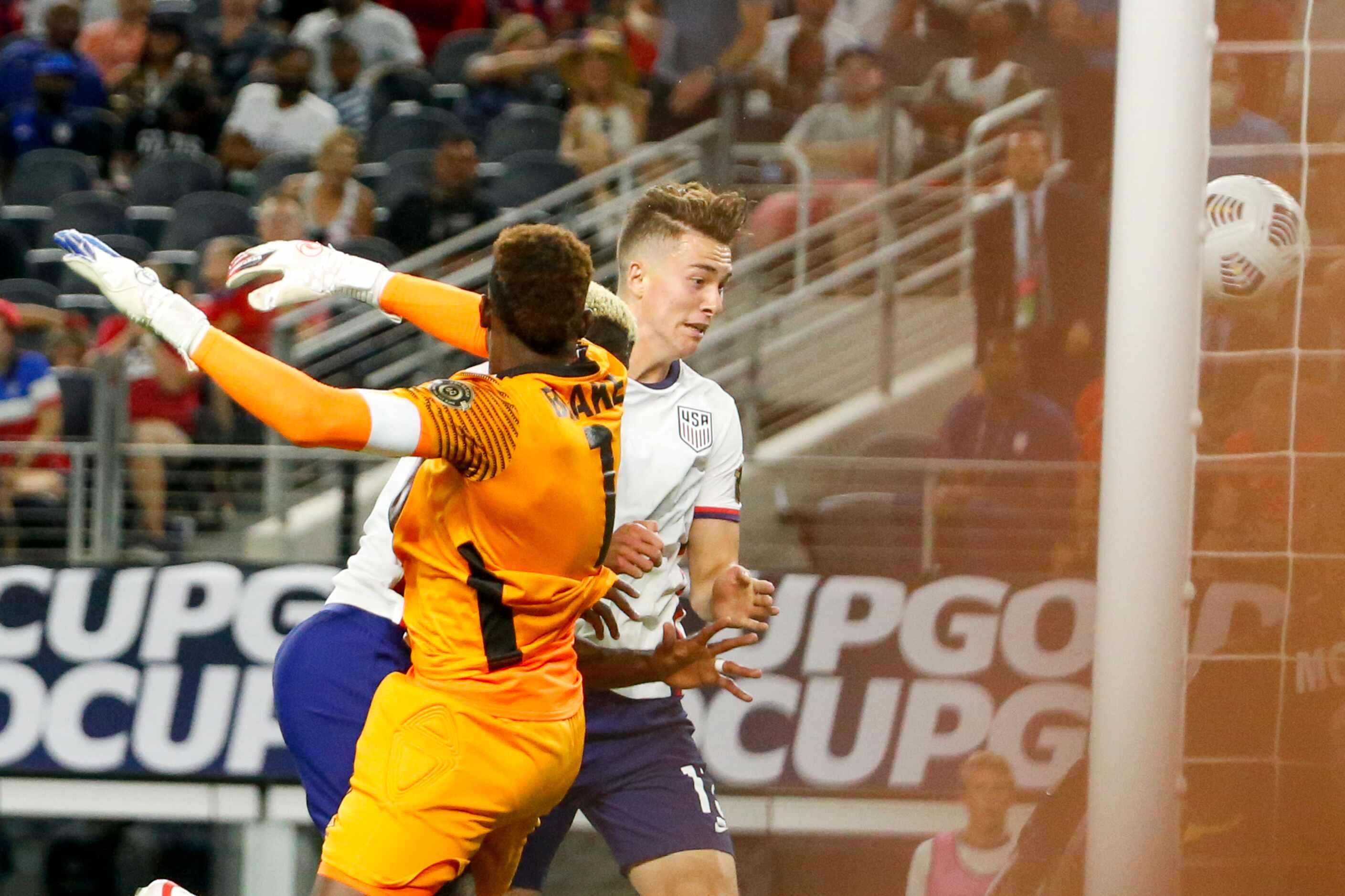 USA forward Matthew Hoppe (13) converts on a header past Jamaica goalkeeper Andre Blake (1)...
