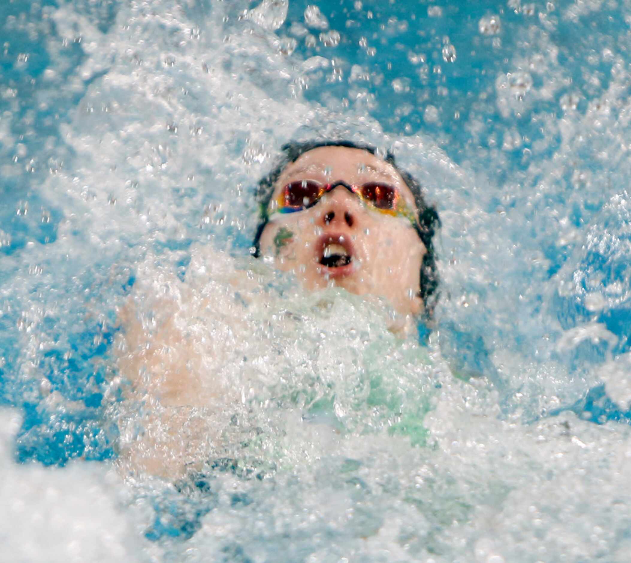 Southlake Carroll's Haley Hildebrand competes as the first leg of her school's 200 Yard...