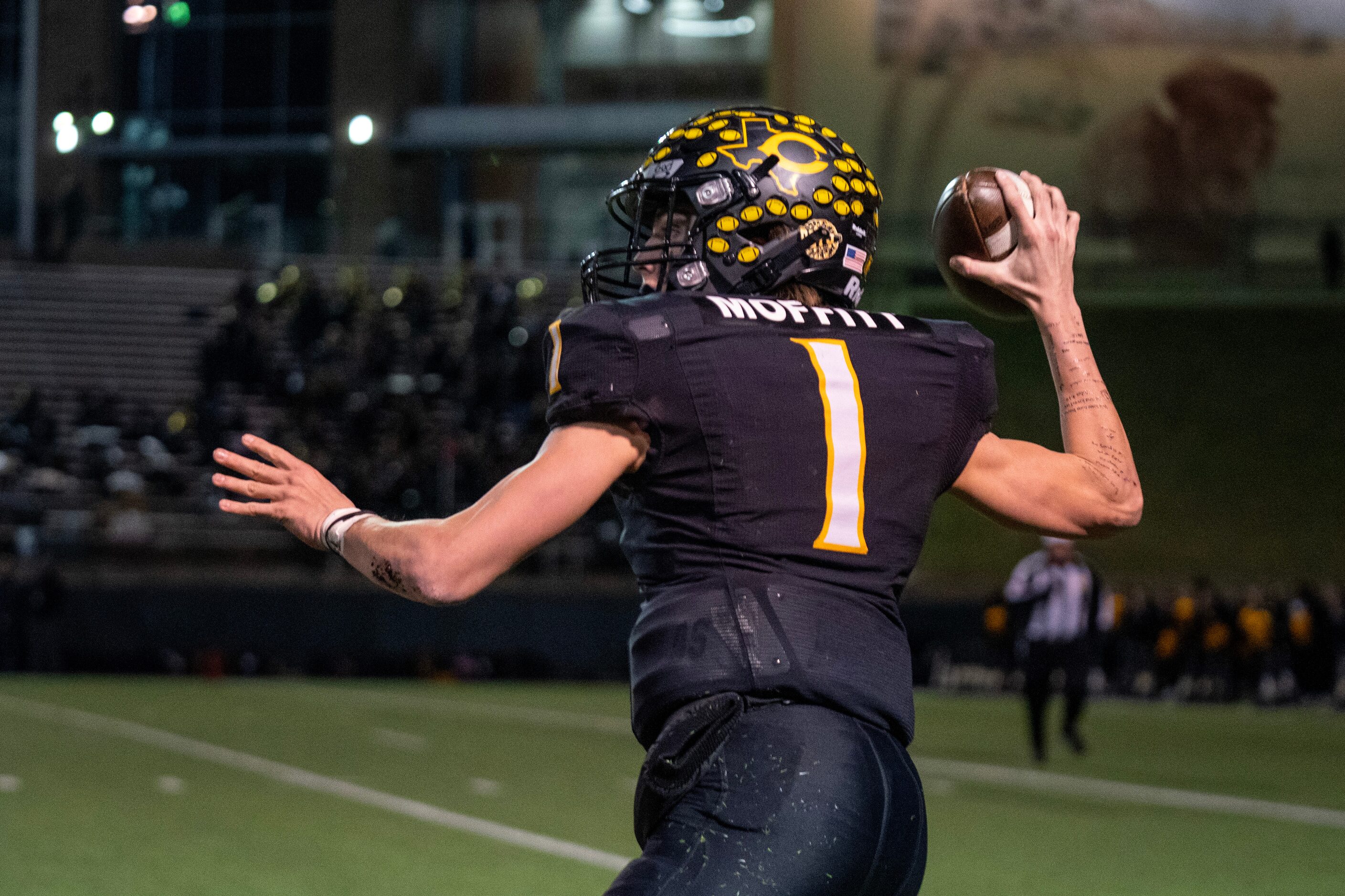 Crandall senior quarterback Luke Moffitt (1) throws downfield during the first half of a...