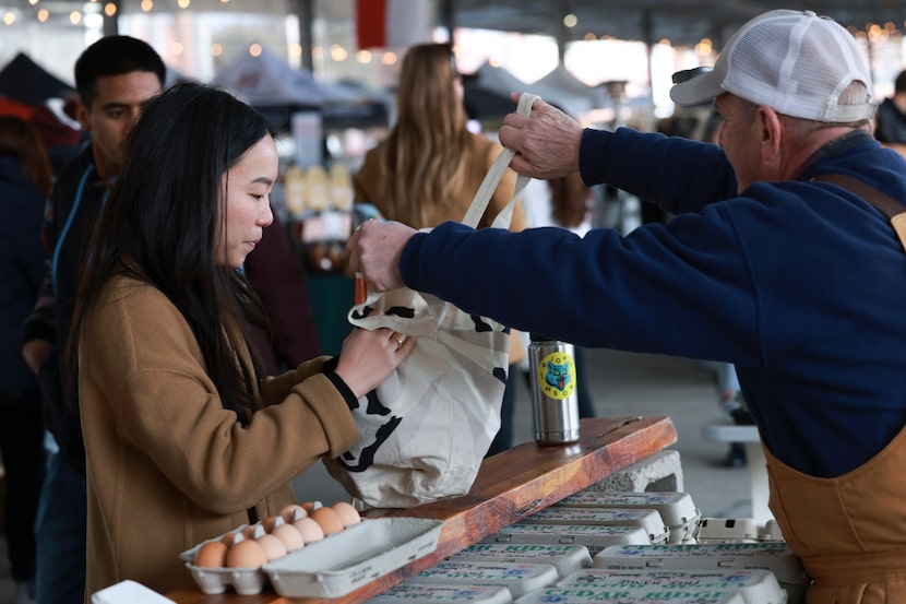 Annieky Yip takes her bag filled with fresh duck eggs from Lee-Lynn’s Farm and Ranch earlier...