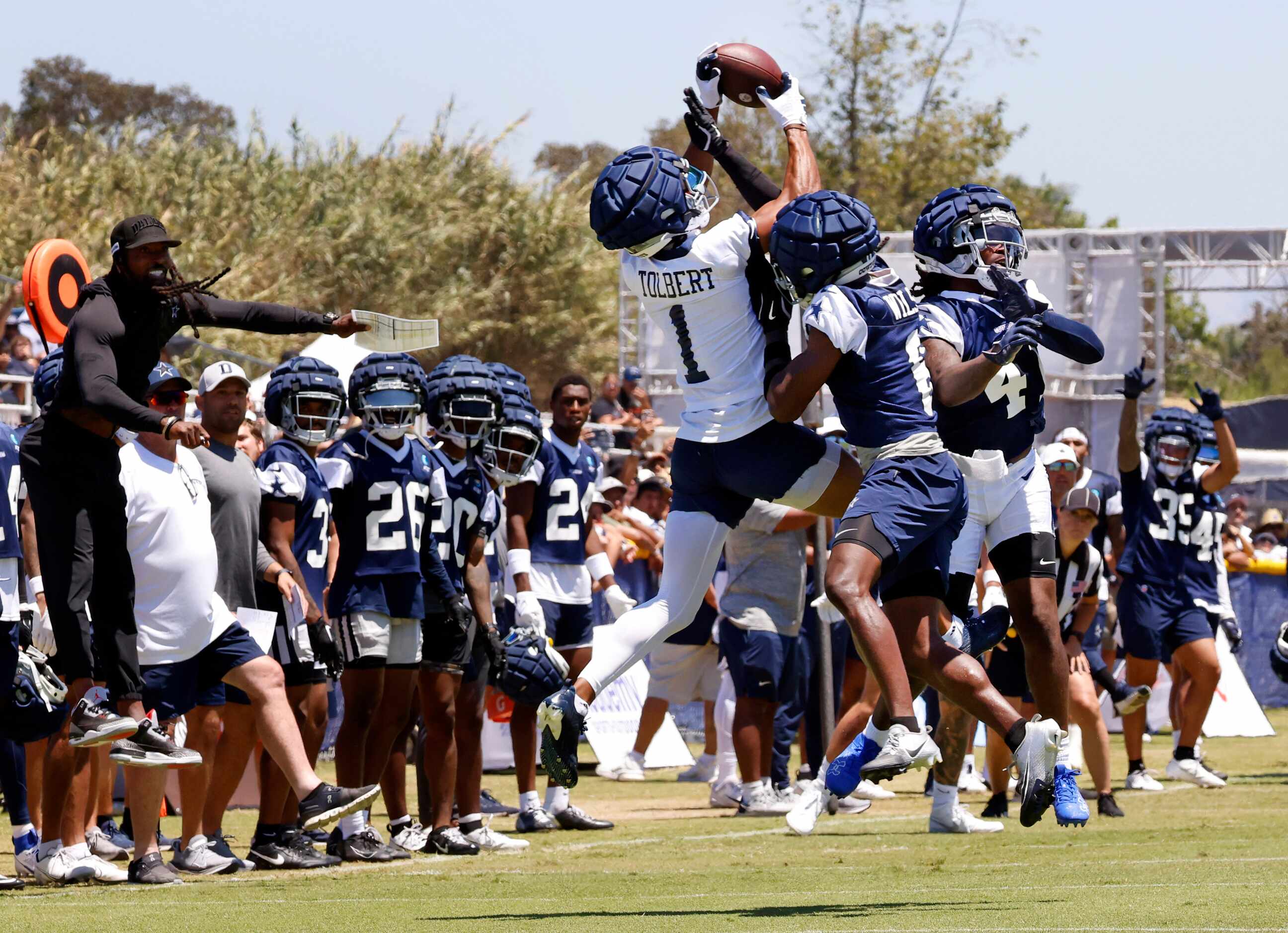 Dallas Cowboys wide receiver Jalen Tolbert (1) goes up for a pass as he’s covered by Dallas...