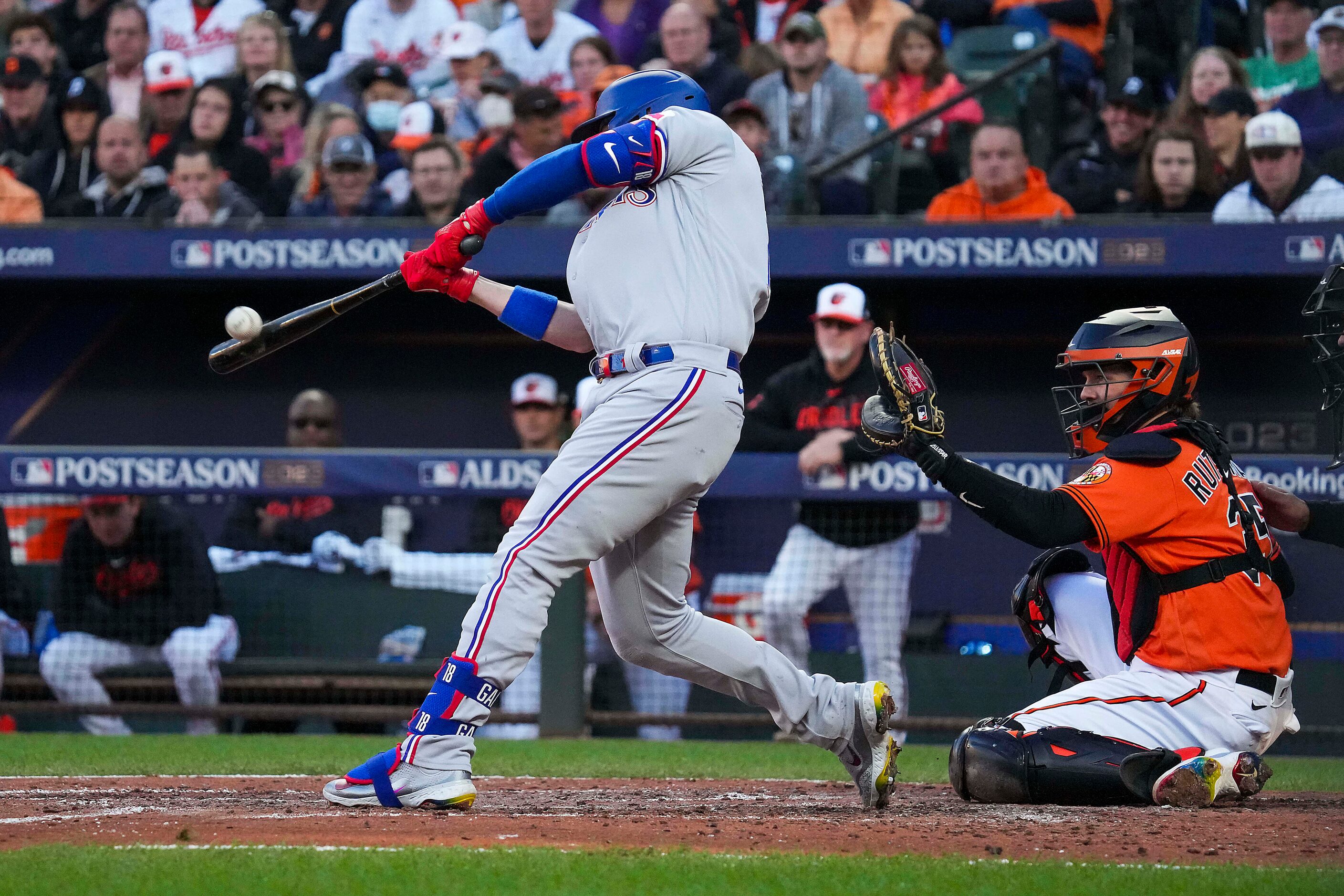 Texas Rangers designated hitter Mitch Garver hits a grand slam during the third inning  Game...