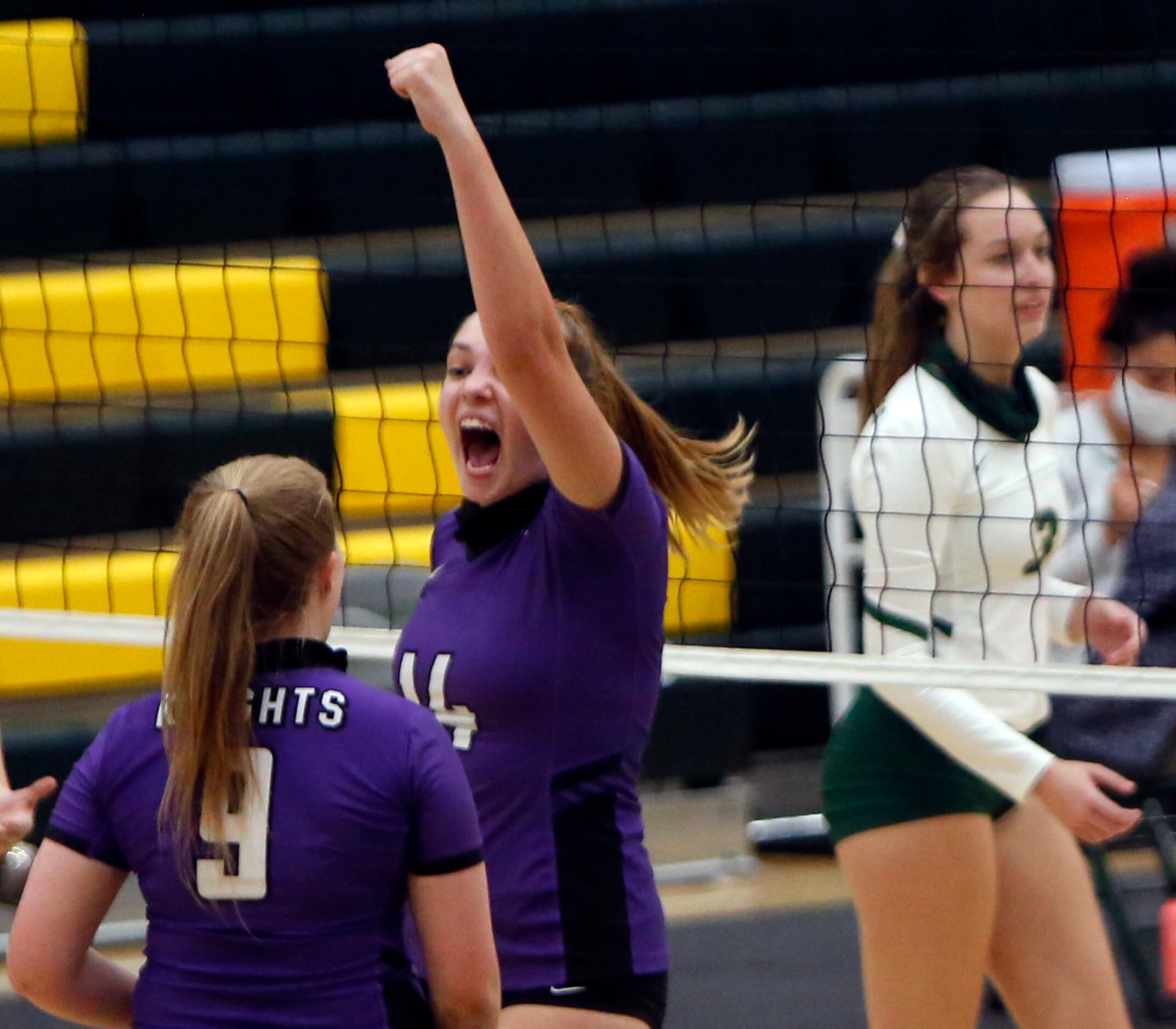 Frisco Independence middle hitter Kaitlyn Bloomer (14) exults after scoring as teammate...