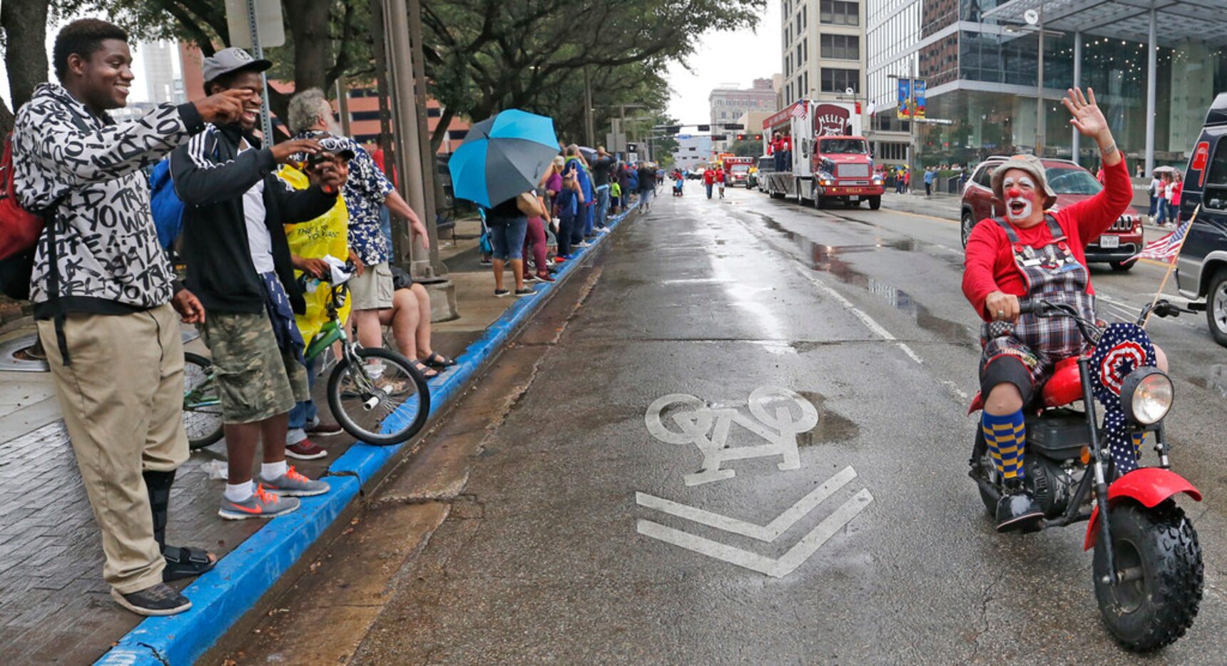 Rain didn't dampen the spirits of both the crowd and the parade participants at the State...