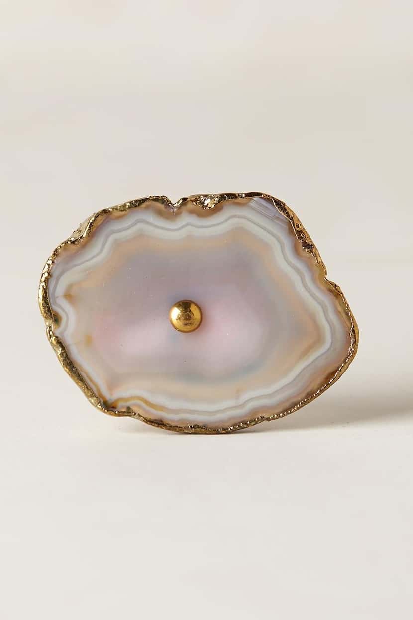 
Geode knobs edged in brass are just the thing for dressing up the drawer of an armoire,...