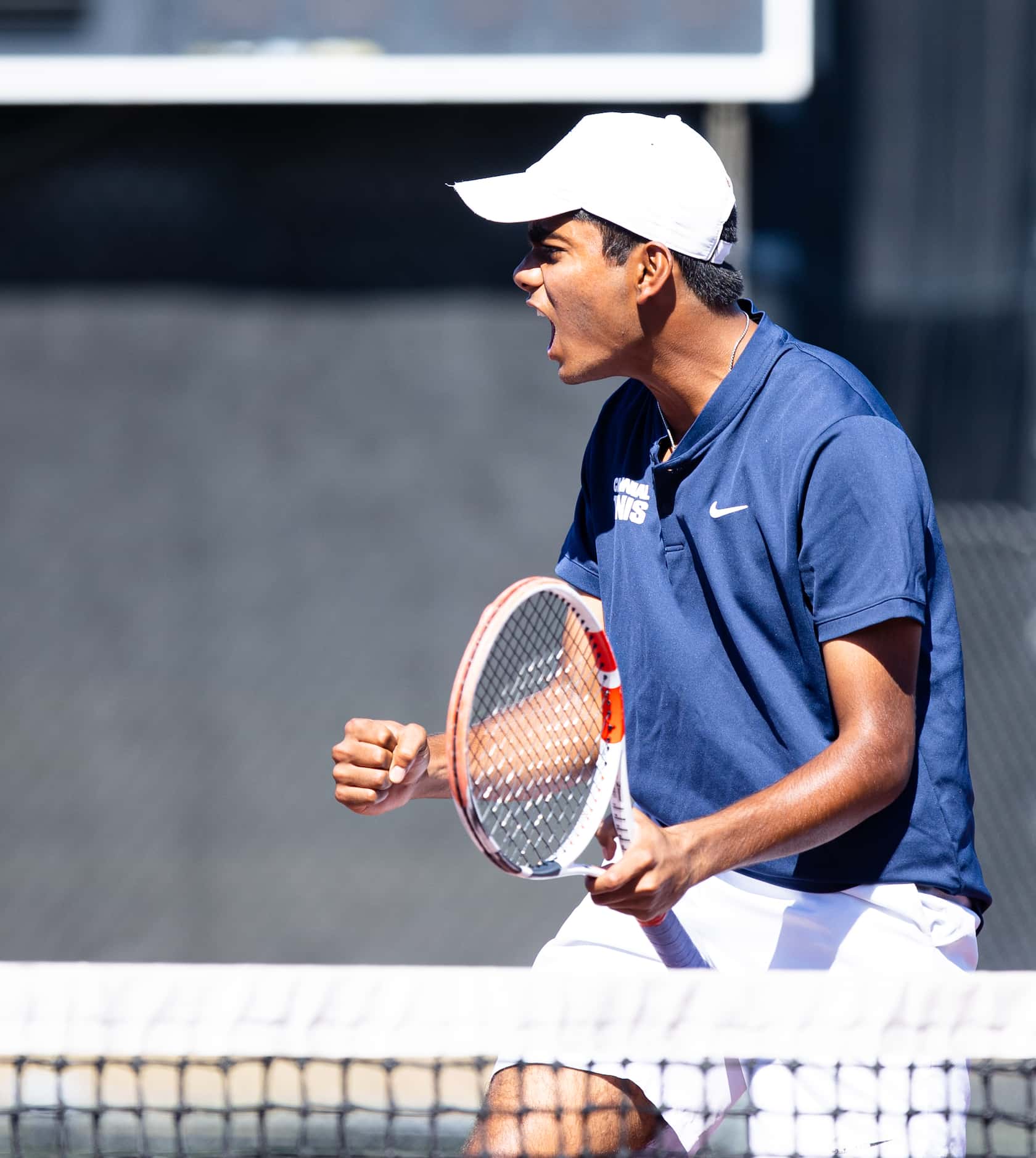 Frisco Centennial’s Aravind Sridhar celebrates during a doubles match with partner Shriyan...