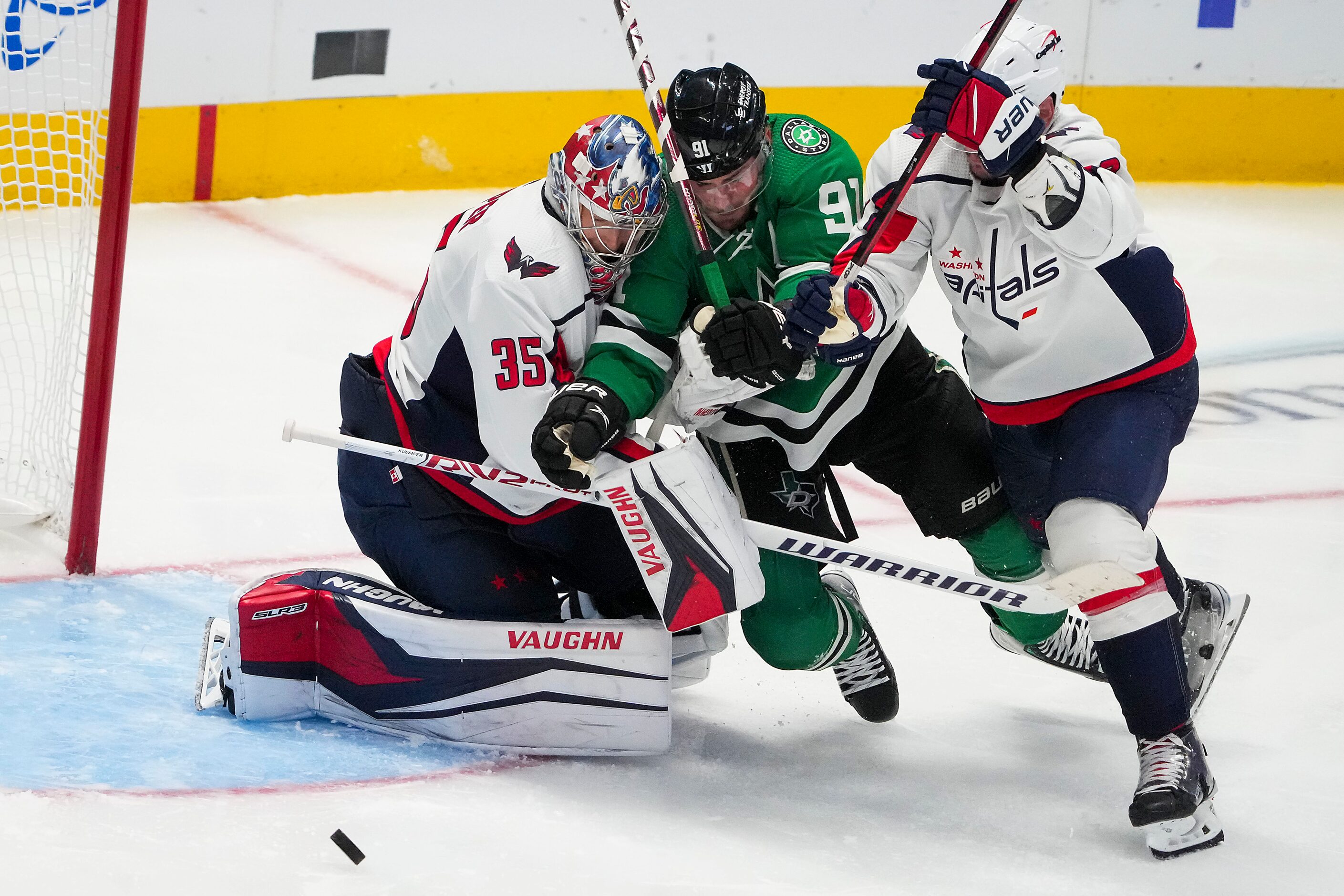 Dallas Stars center Tyler Seguin (91) is jammed up between Washington Capitals goaltender...