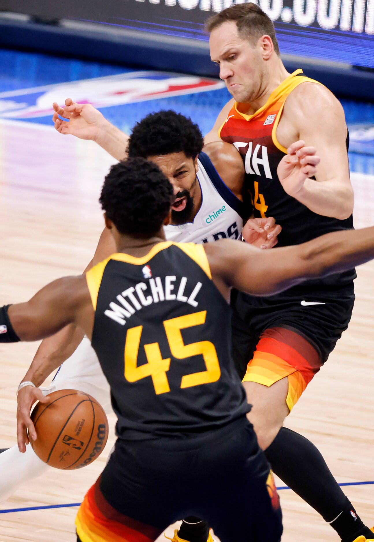 Dallas Mavericks guard Spencer Dinwiddie (26) tries to squeeze by Utah Jazz forward Bojan...