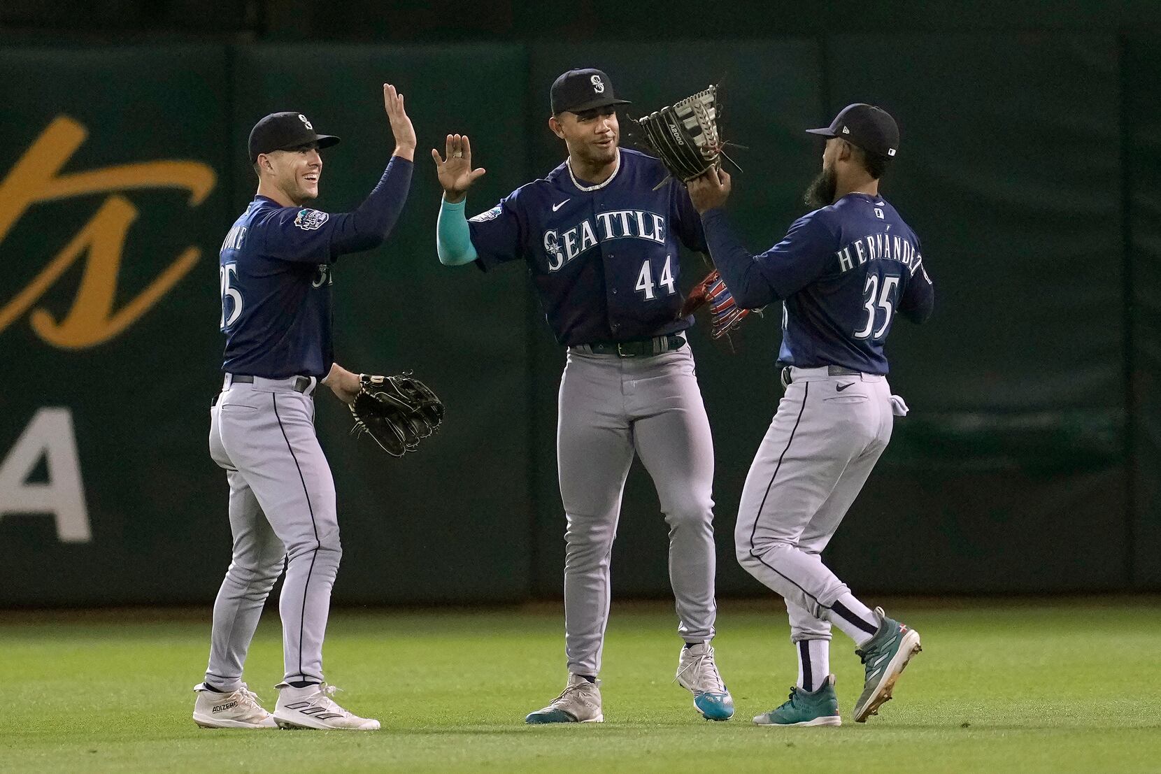 Sam Haggerty of the Seattle Mariners celebrates a run against the