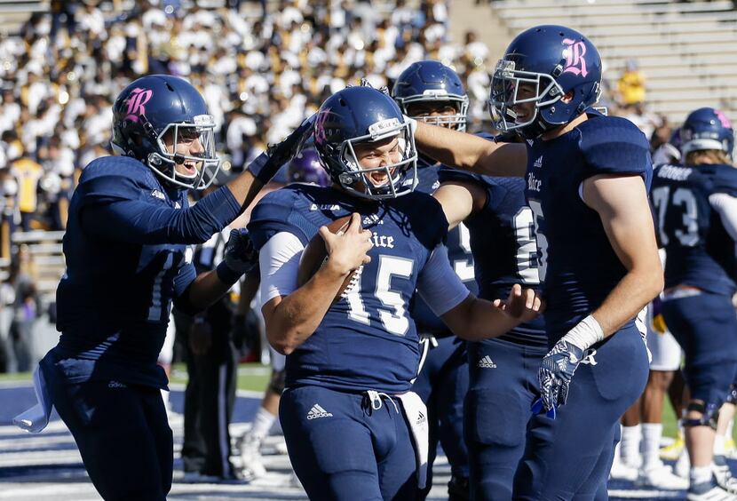 HOUSTON, TX - OCTOBER 22:  J.T. Granato #15 of the Rice Owls celebrates with teammates after...