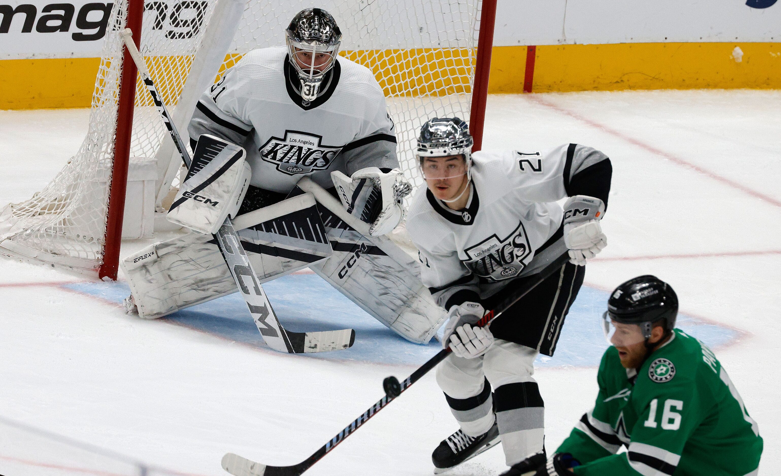 Los Angeles Kings defenseman Jordan Spence (21) blocks a shot in front of Dallas Stars...