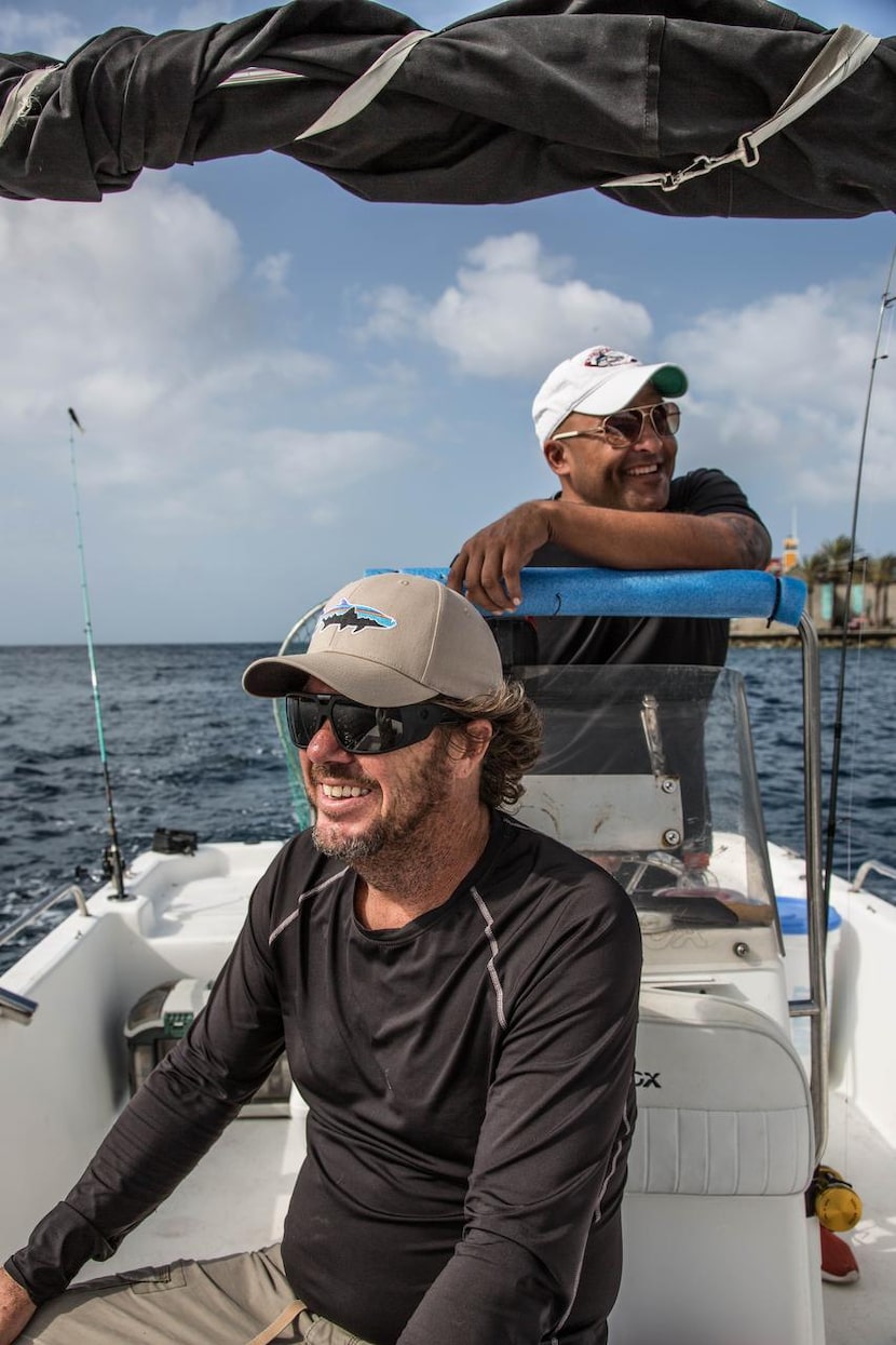 Norman Chumaceiro (left)  and Albert Macares trade jokes as they angle for the king of all...