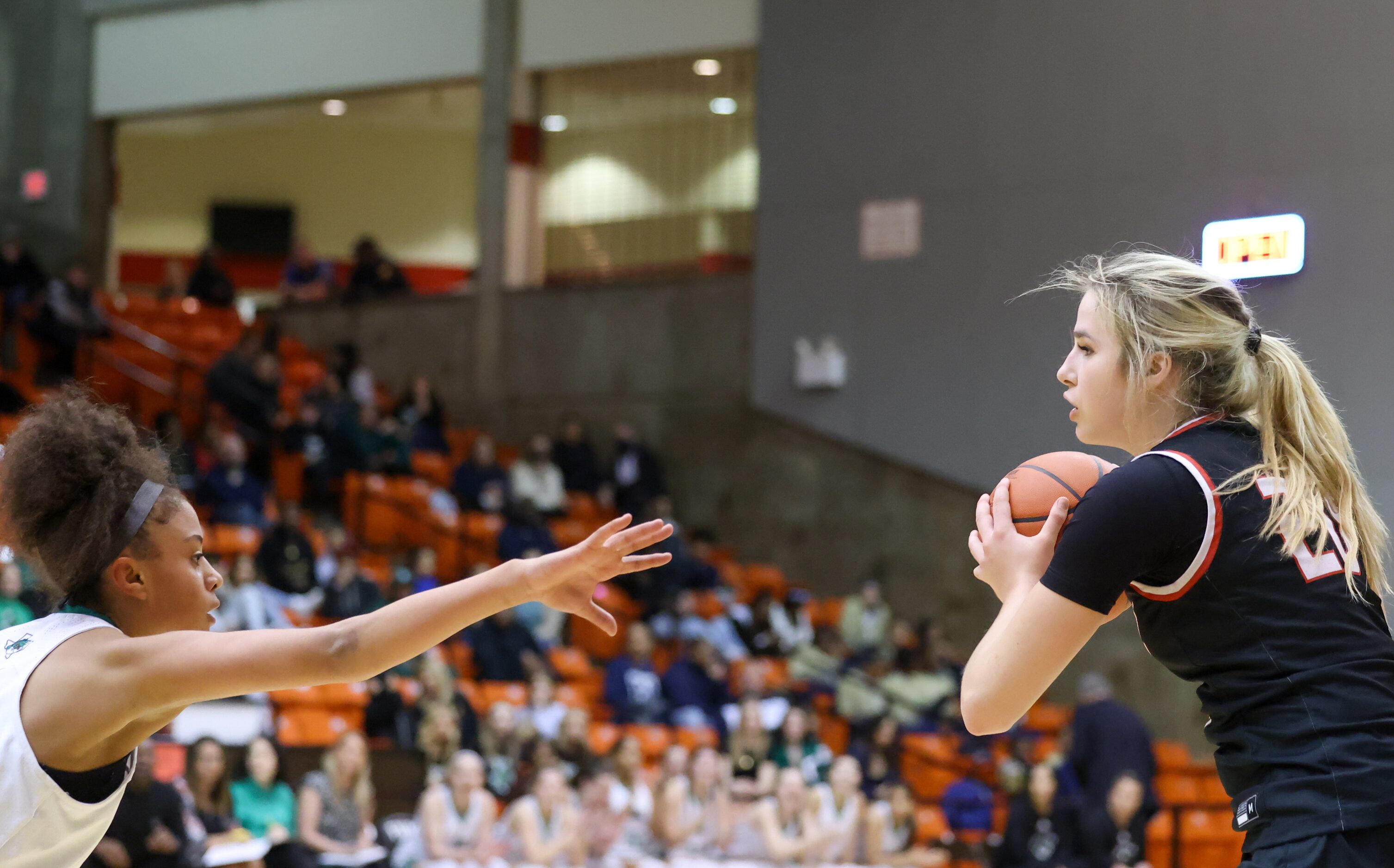 Southlake Carroll freshman guard Gianna Jordan (10) faces off with Coppell senior guard...