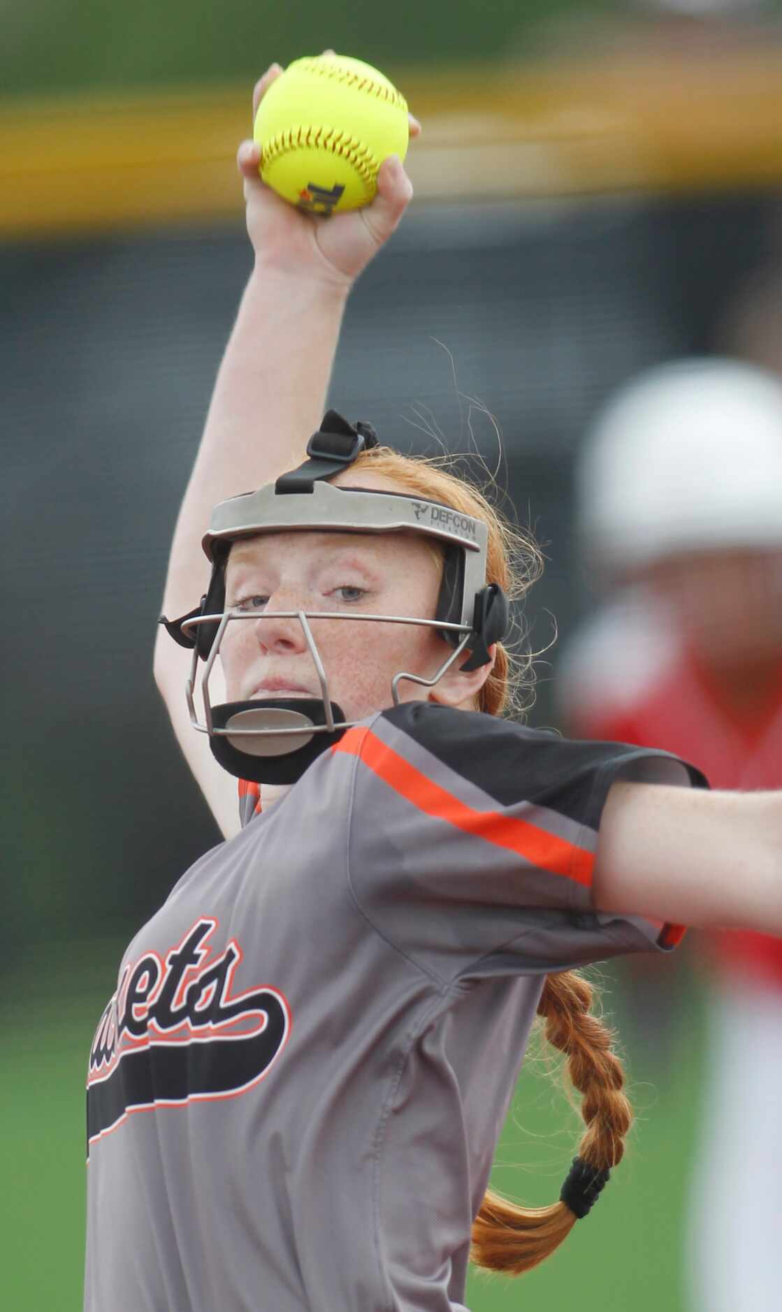 Rockwall pitcher Ainsley Pemberton (9) delivers a pitch in the bottom of the first inning...