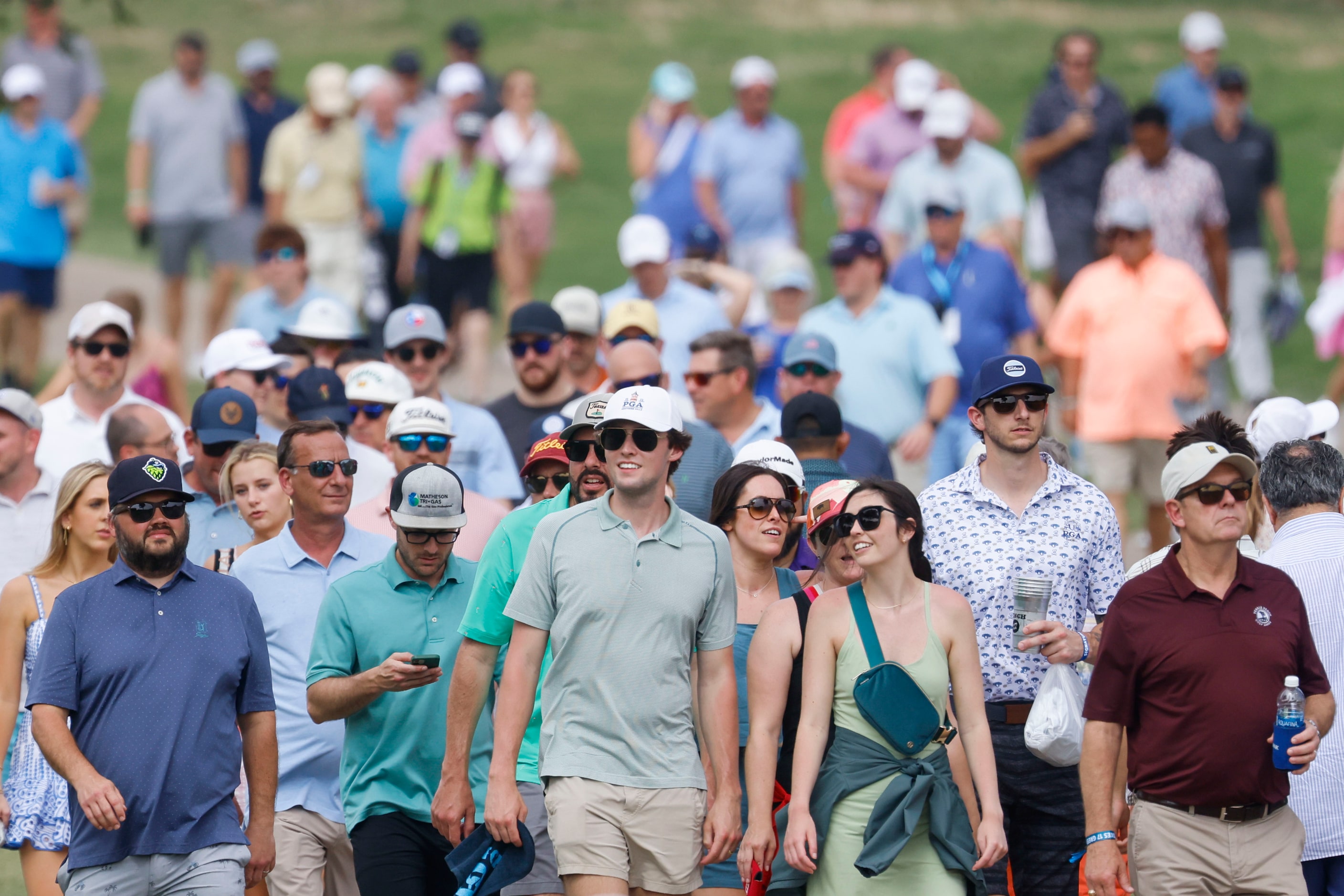 Crowd commute during the second round of the AT&T Byron Nelson at TPC Craig Ranch on Friday,...