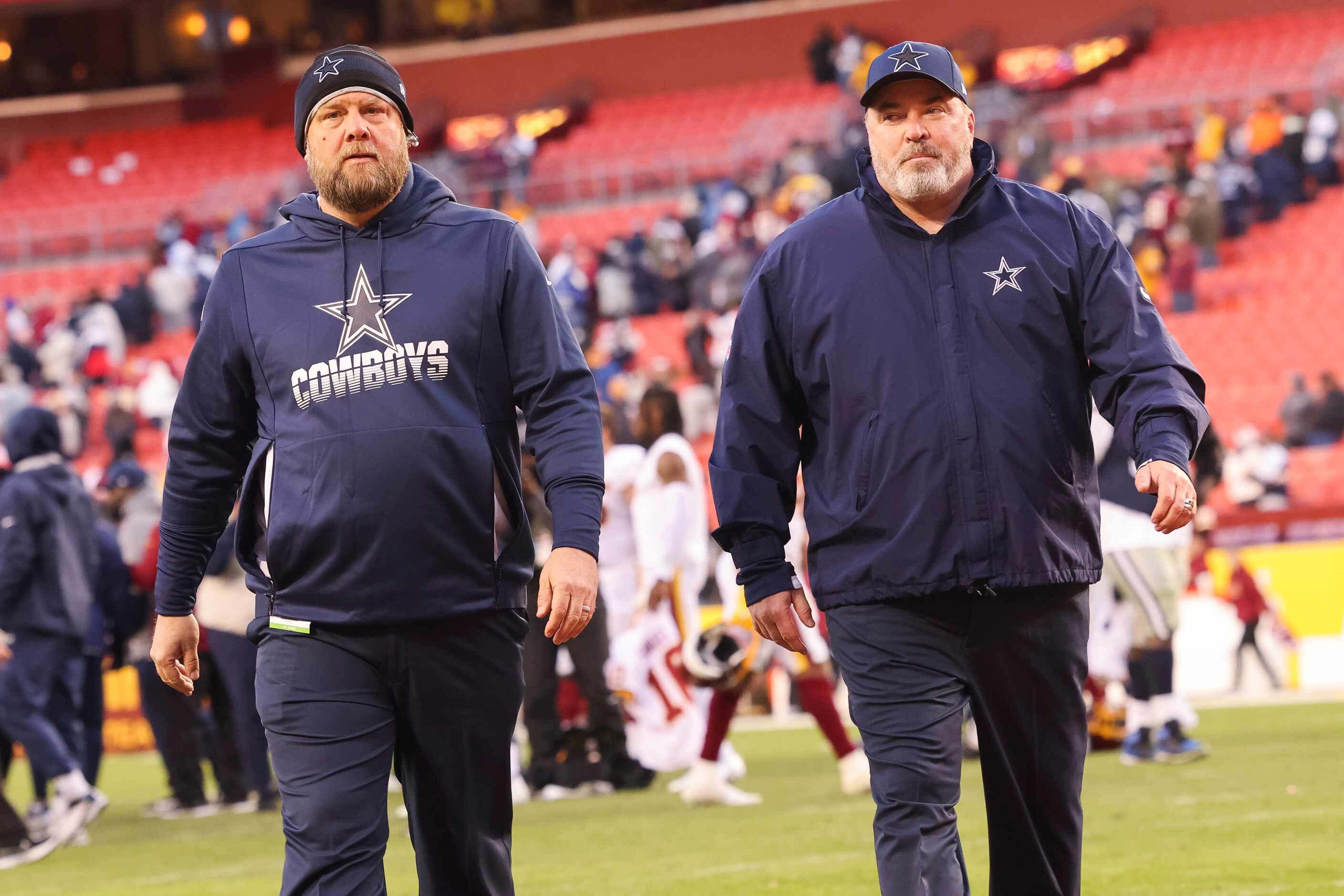 Dallas Cowboys head coach Mike McCarthy (right) leaves the field after winning against the...