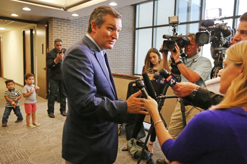 United States Senator Ted Cruz talks with the media as he makes a stop at the Republican...