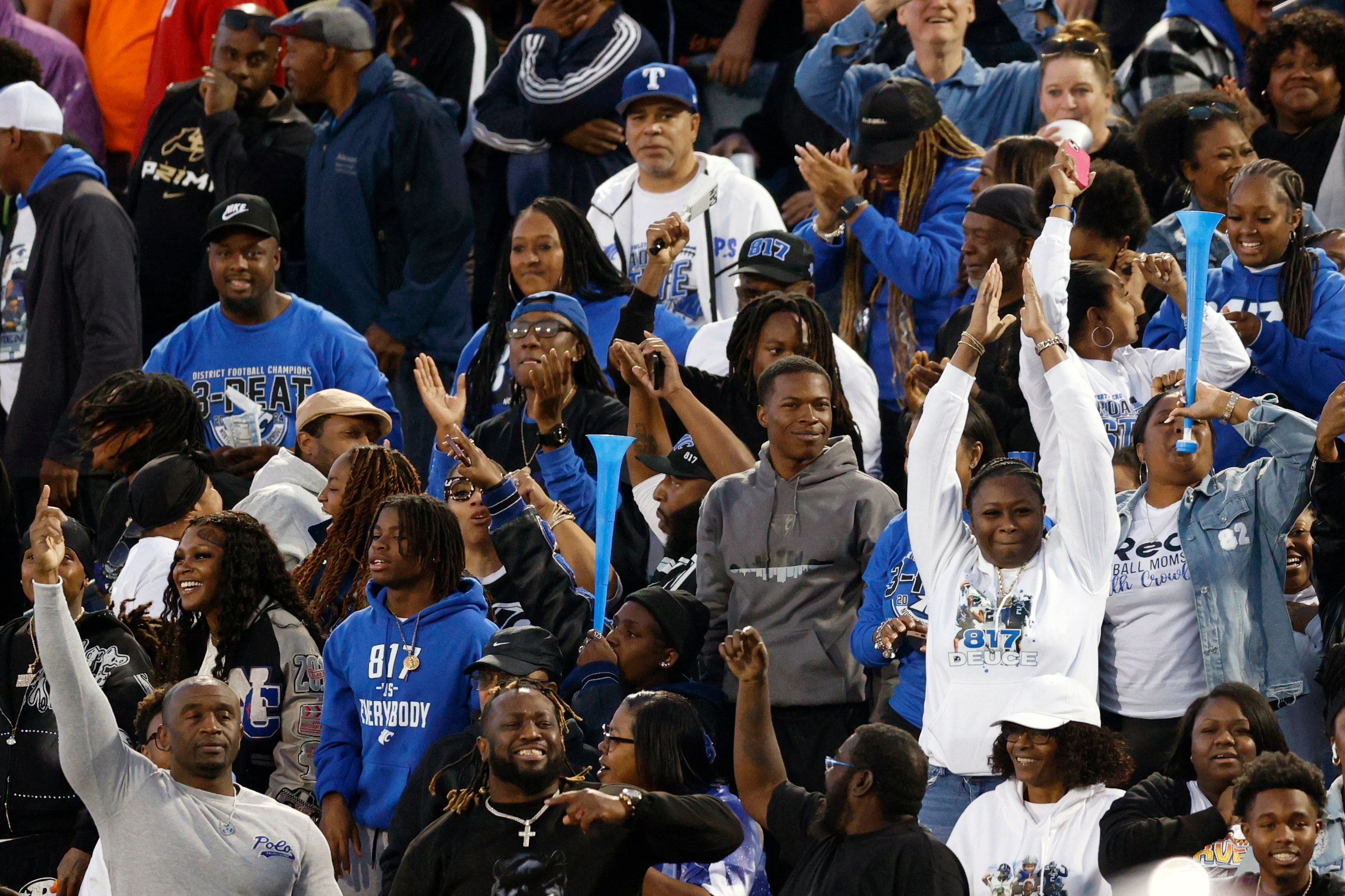 North Crowley fans celebrate after a touchdown during the second half of a Class 6A Division...