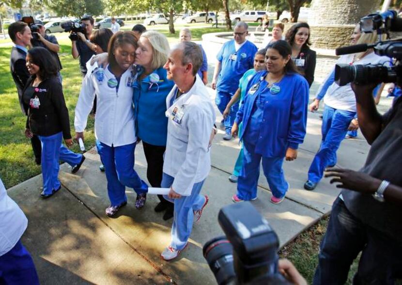Texas Health Presbyterian nurse Chantea Irving got a kiss from senior vice president and...