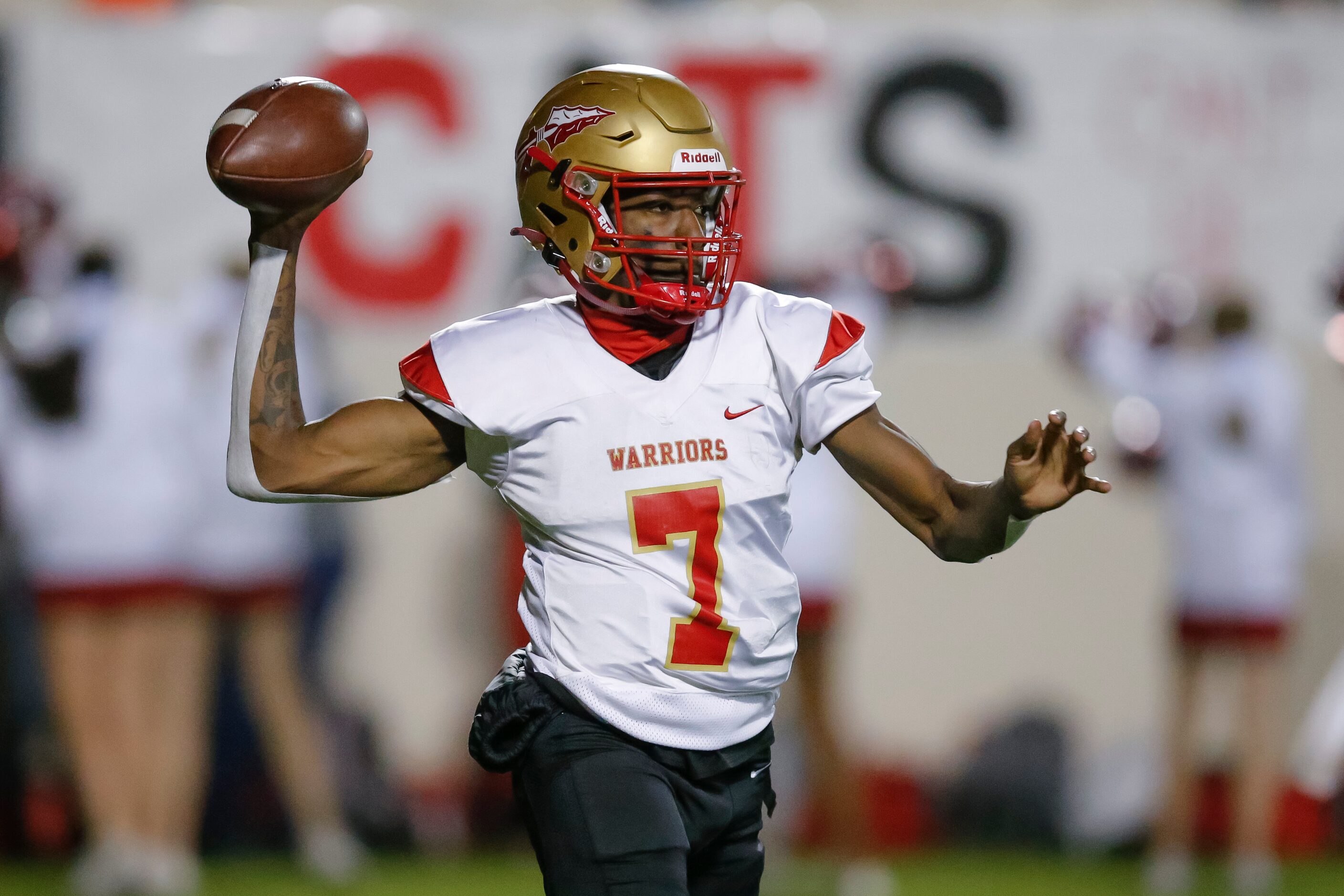 South Grand Prairie senior quarterback Michael Stallworth (7) throws during the first half...