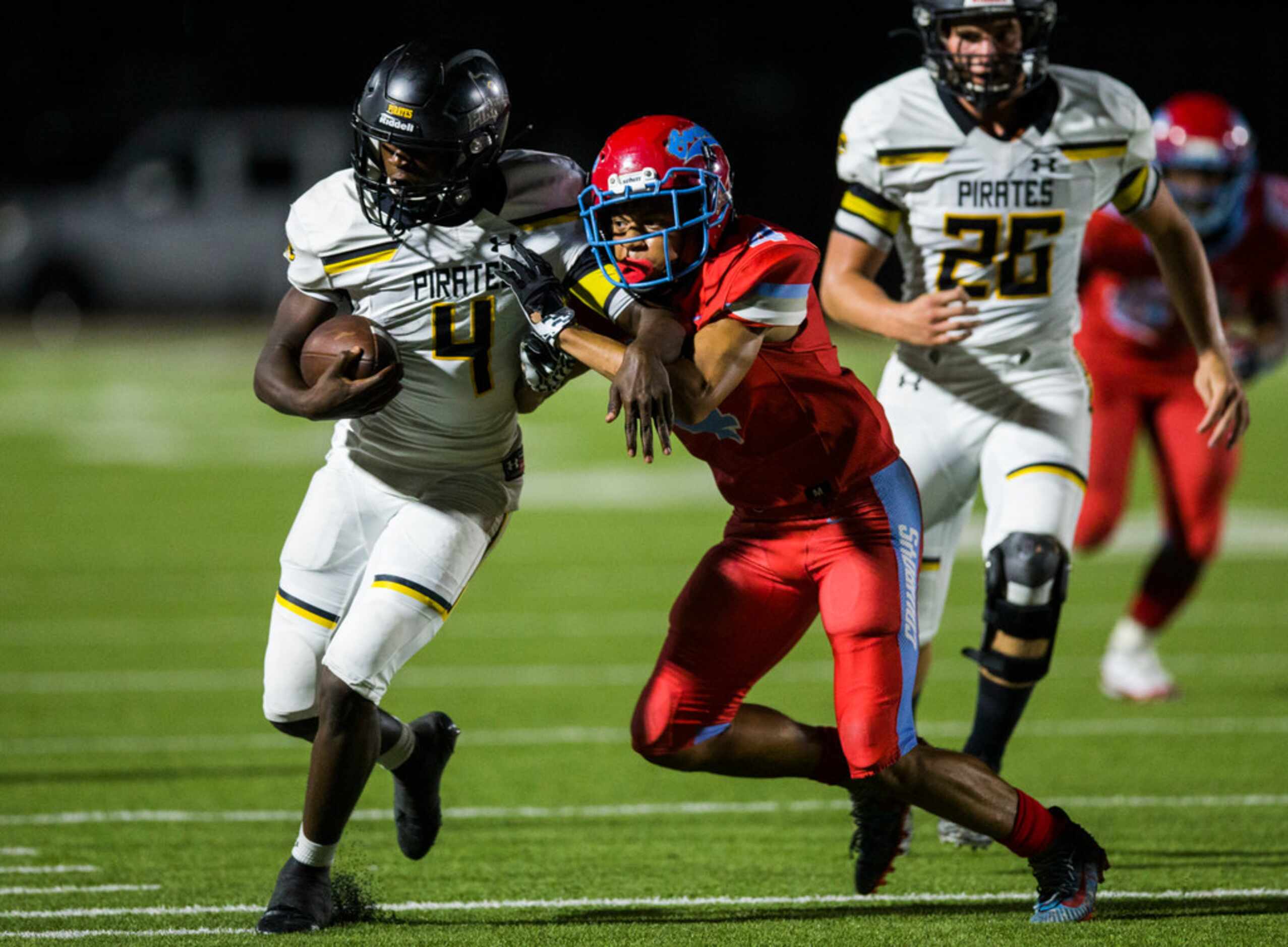 Crandall running back Chris Abron (4) is pushed out of bounds by Carter defensive back...