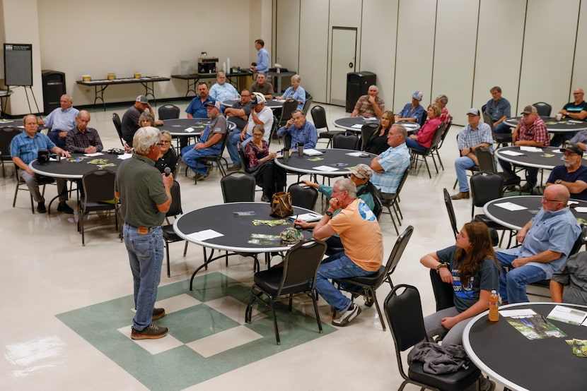 Residents listen to Jim Thompson, Chair of North East Texas Regional Water Planning Group...