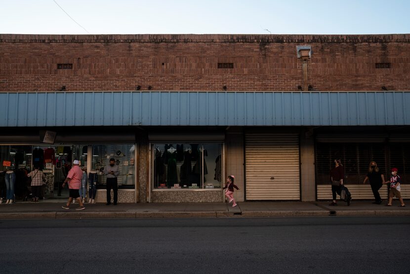 People walked by the downtown area in Laredo on Saturday, Nov. 13, 2021. Some businesses...