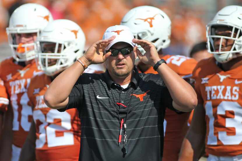 University of Texas Longhorns head coach Tom Herman is pictured during warmups before the...