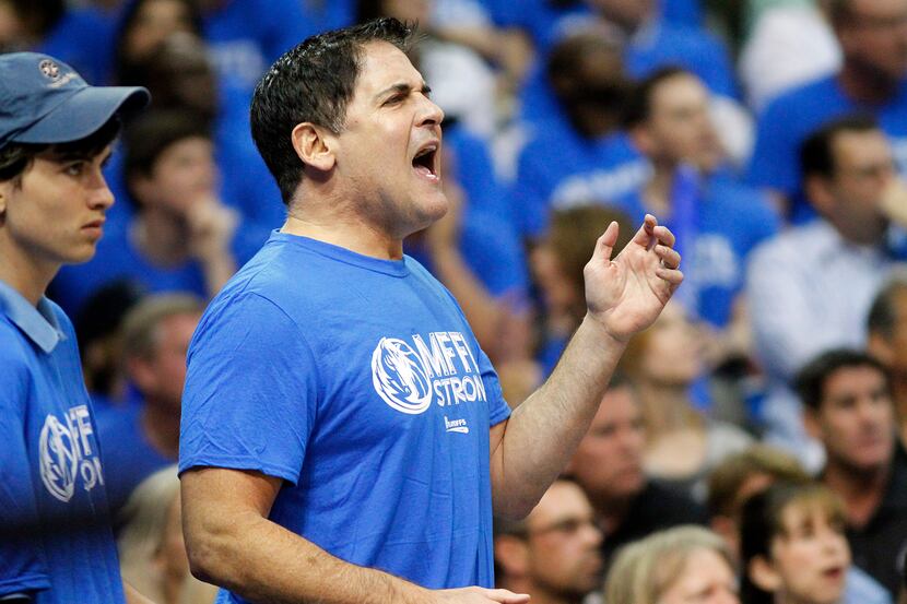 Dallas Mavericks owner Mark Cuban reacts to a call during the first half of the NBA Western...