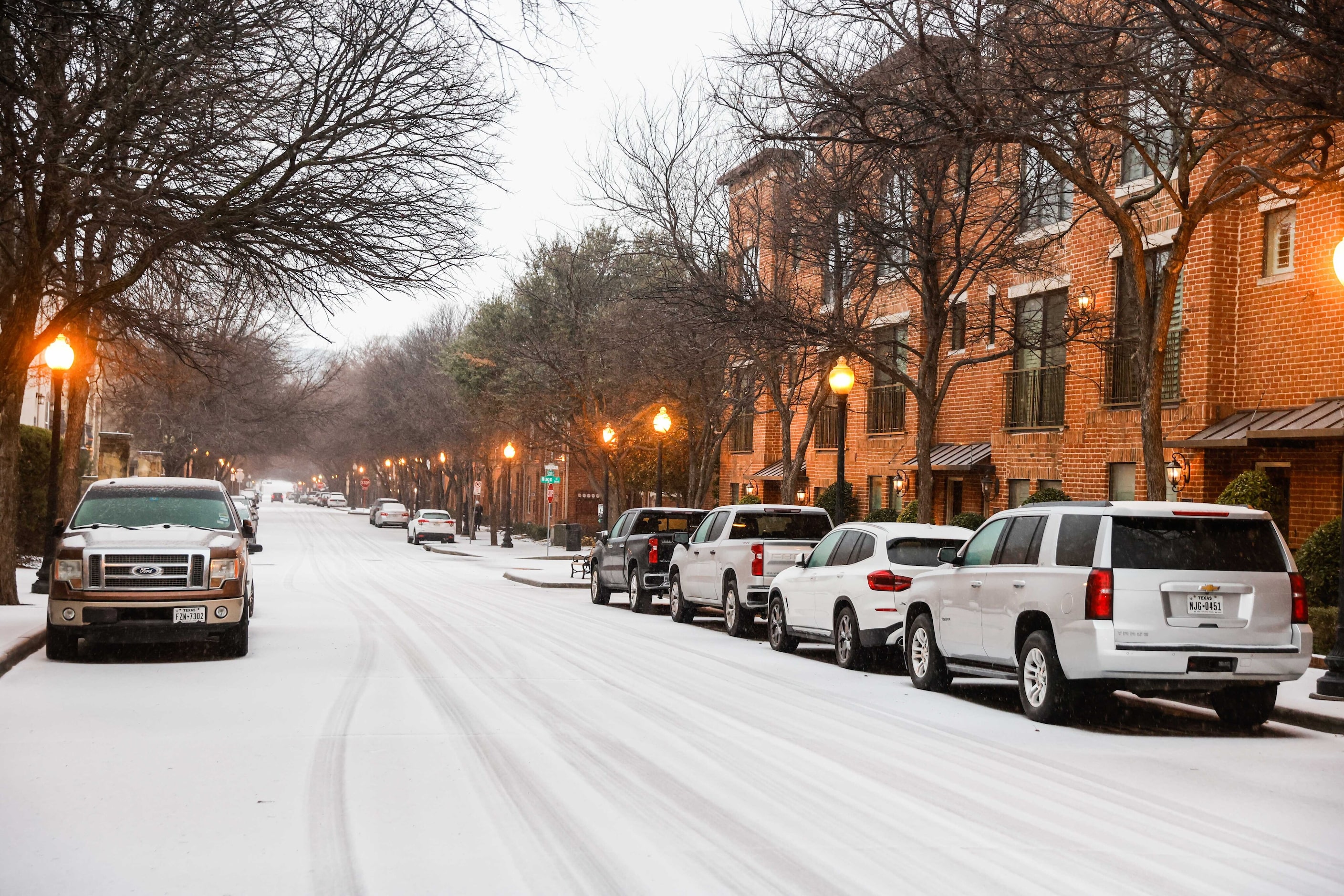 Sleet falls over State St and N Hall St on Tuesday, Jan. 31, 2023. Weather conditions are...