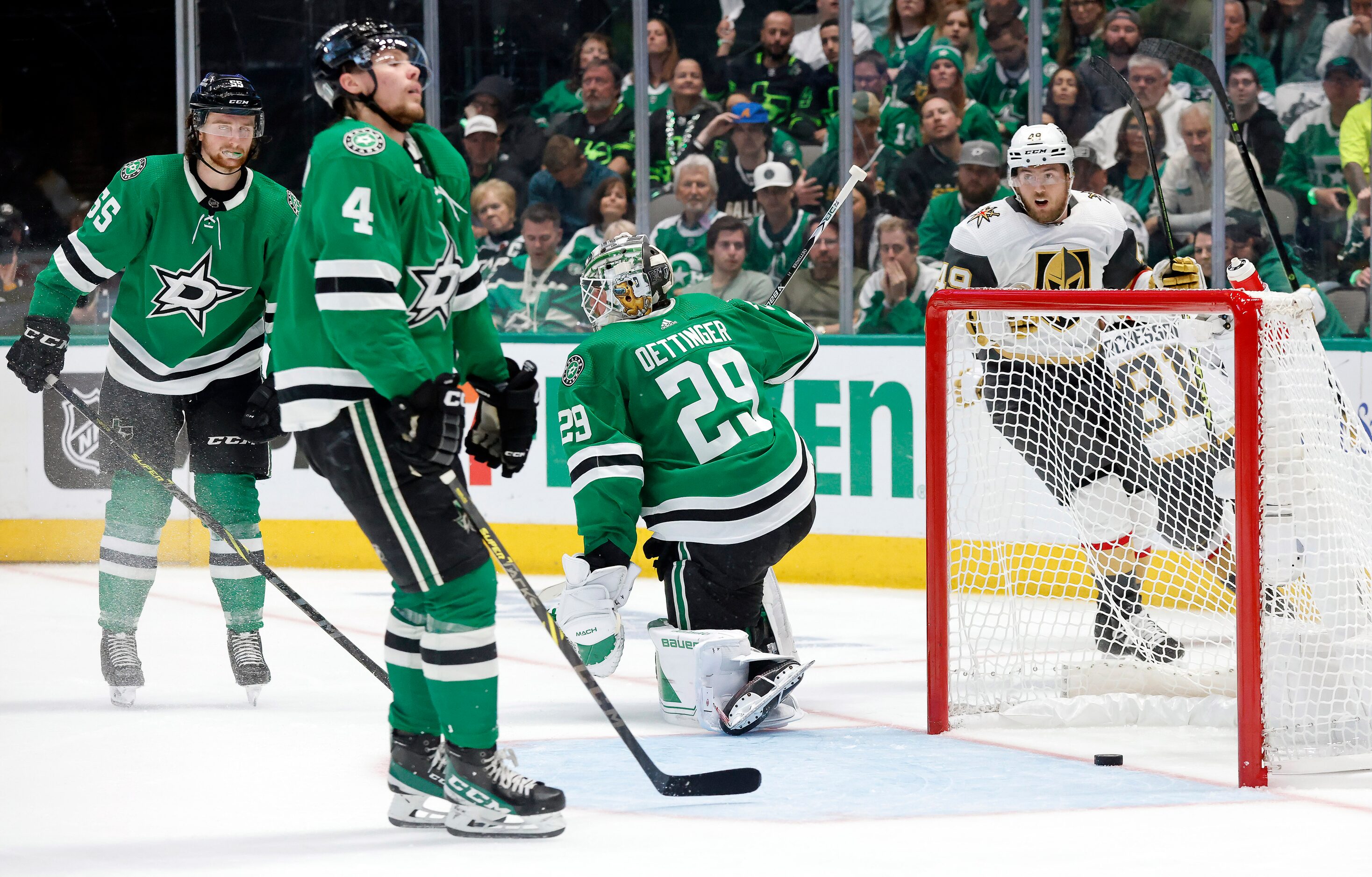 Dallas Stars defenseman Thomas Harley (55) and defenseman Miro Heiskanen (4) react after...