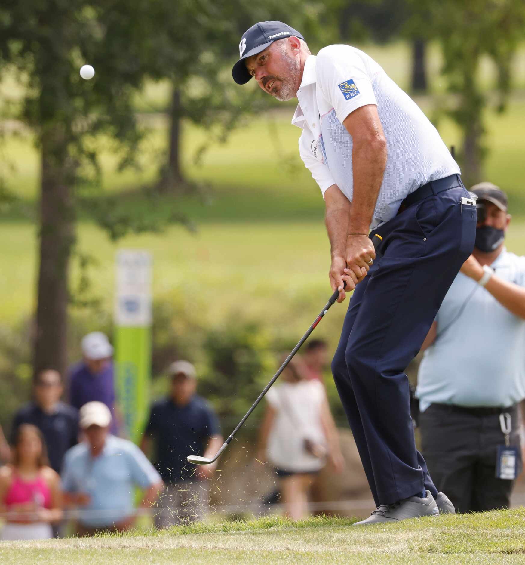Matt Kuchar watches his ball on the 14th hole during round 3 of the AT&T Byron Nelson  at...