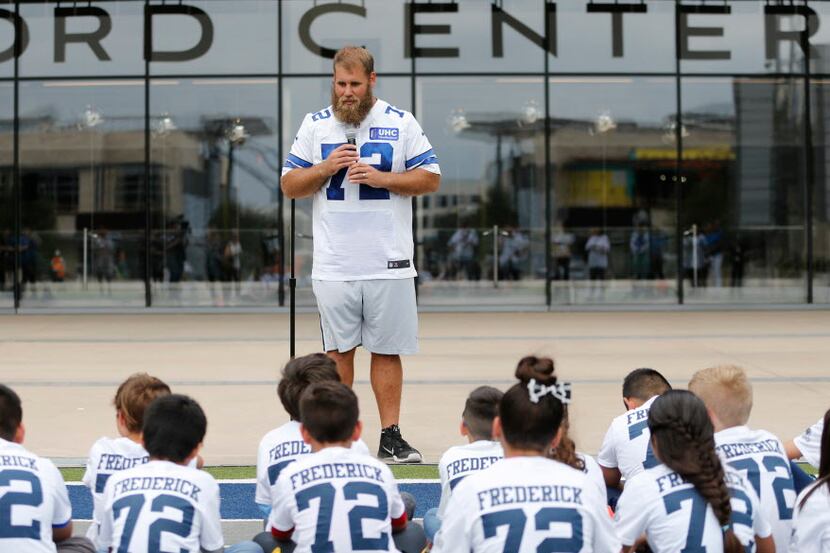 Dallas Cowboys center Travis Frederick (72) answers questions from Christie elementary...